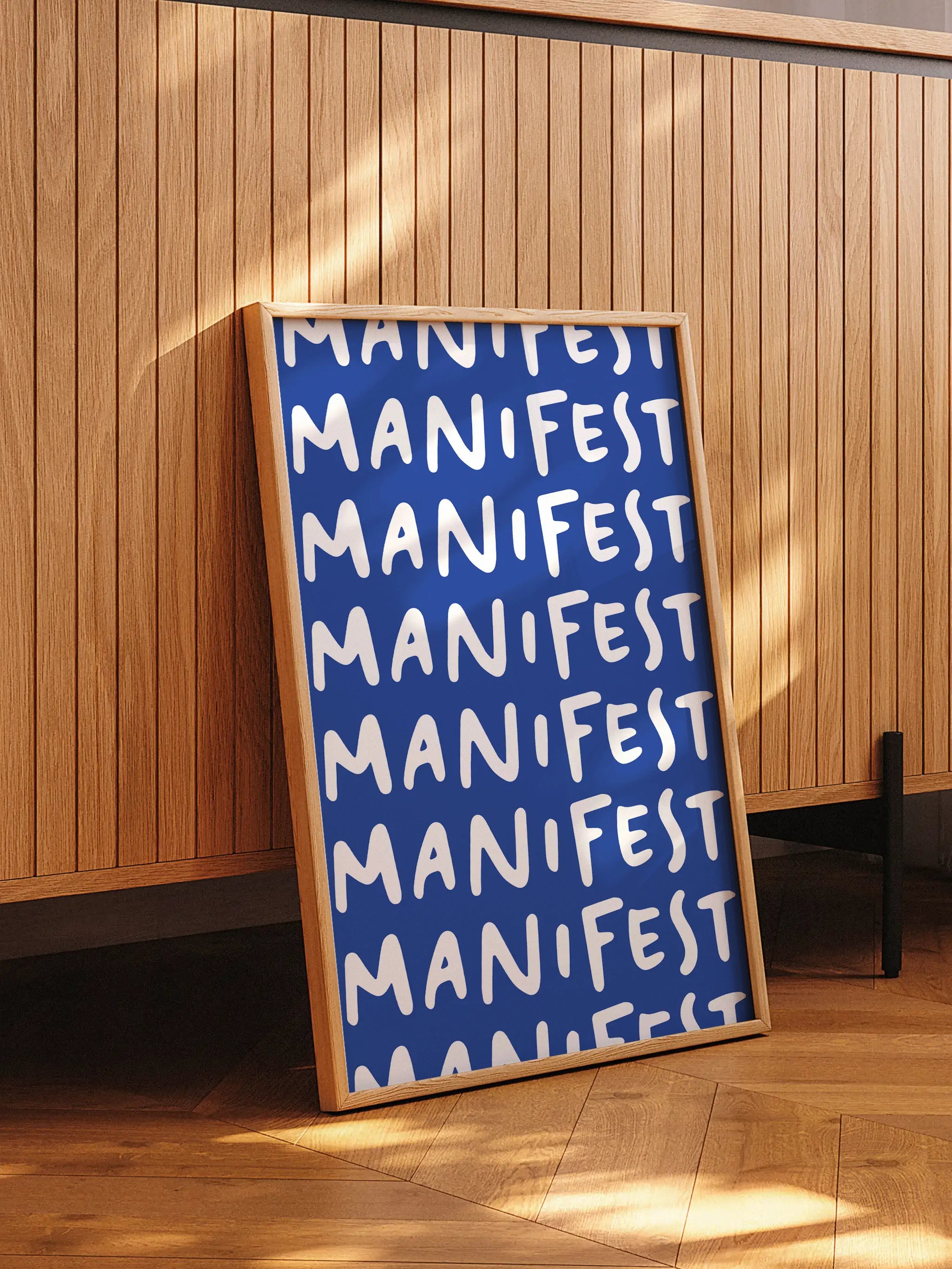 Repeated "Manifest" typography in white on a bold blue background.